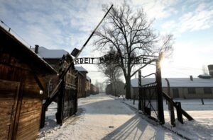 The gate of the former Auschwitz-Birkenau extermination camp/Shutterstock
