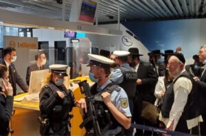 Jewish passengers who were kicked off a Lufthansa flight were greeted by the police once they arrived in Frankfurt. (Courtesy via JTA)