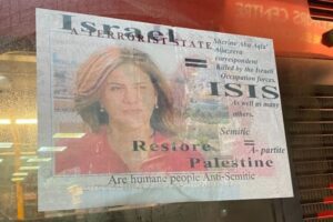 Poster asking if antisemitism is “humane” found on Golders Green bus stop