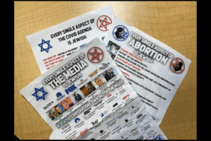 Antisemitic leaflets lay on a table in Longview. These flyers were found last week in sandwich baggies filled with rice in the Old West Side neighborhood of Longview. Hayley Day