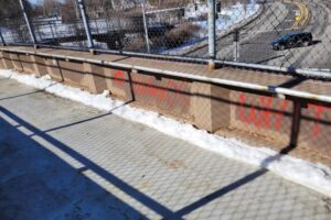 New hateful graffiti was found on a pedestrian bridge in Portsmouth on Friday, March 3, 2023, days after numerous downtown buildings and places of worship were targeted with similar vandalism. The Portsmouth Police Department
