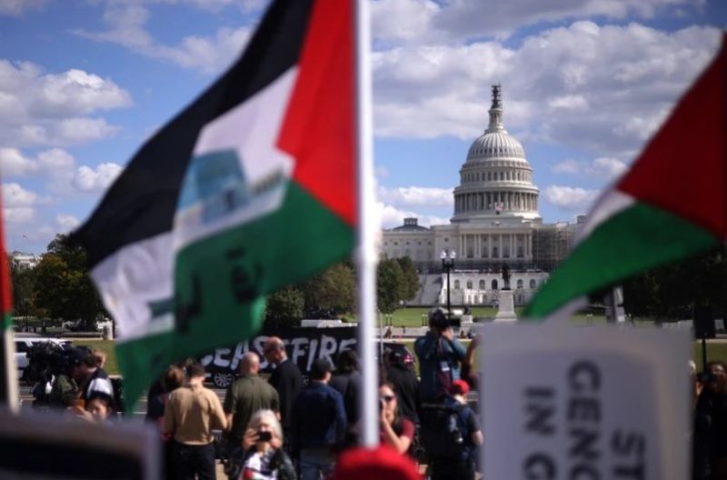 Protesters stage a demonstration in support of a cease fire against the Palestinians in Gaza at the national mall on October 18, 2023 in Washington, DC. members of the Jewish voice for peace and the ifnotnow movement staged a rally to call for a cease fire in the Israel–Hamas war. (Alex Wong/Getty images)